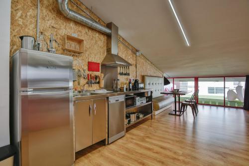 Dapur atau dapur kecil di Tomate Rooms