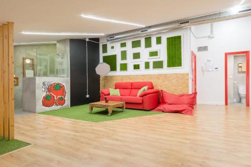 Ruang duduk di Tomate Rooms