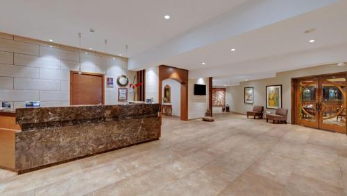 a lobby of a hotel with a reception desk at The Fern Kesarval Hotel & Spa, Verna Plateau - Goa in Verna