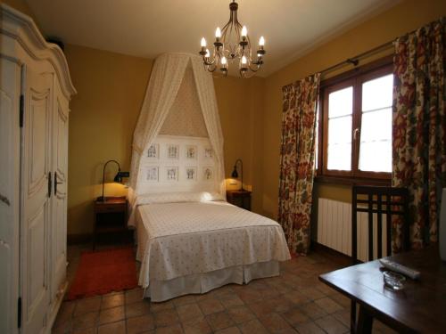 Postel nebo postele na pokoji v ubytování Hotel Posada La Robleda