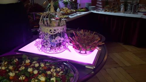 a buffet with two tables of food and a buffet at Hotel Wippertal - voll klimatisiert in Bernburg