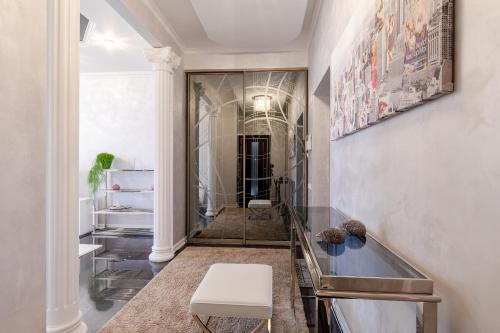 a bathroom with a sink and a counter in a room at Botanic Towers the house has a shelter in Kyiv