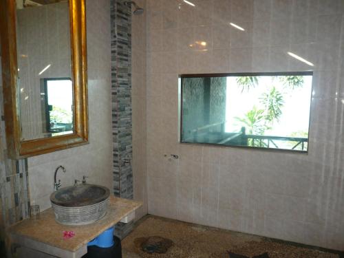 Kupatilo u objektu Wawa Wewe II Villas