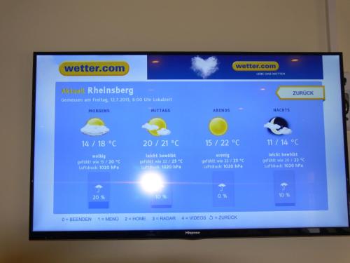 a television screen with a website on it at Gasthof & Fleischerei Endler in Rheinsberg