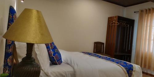 Cama o camas de una habitación en Heranya La:Ku