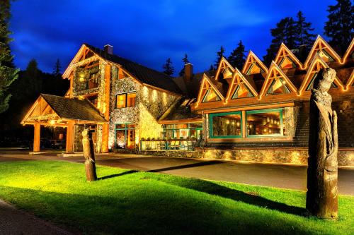 a large house with a large roof at Hotel Tri Studničky - Adult friendly in Demanovska Dolina