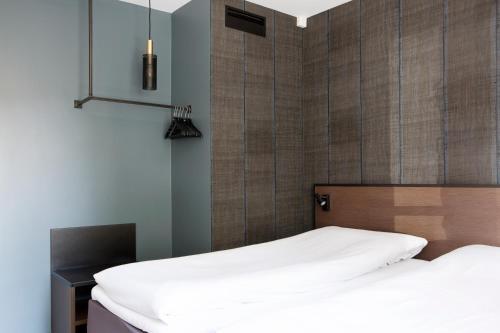 two beds sitting next to each other in a bedroom at Comfort Hotel Bergen in Bergen