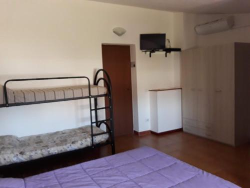 Cama o camas de una habitación en B&B I 4 Venti