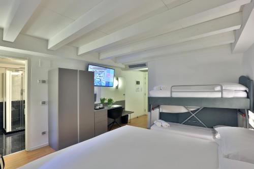 Postel nebo postele na pokoji v ubytování Urban Hotel Design