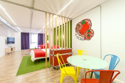 Televisyen dan/atau pusat hiburan di Tomate Rooms