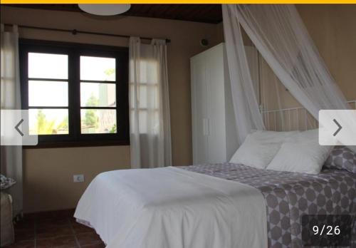 Ένα ή περισσότερα κρεβάτια σε δωμάτιο στο Apartamento Kiril
