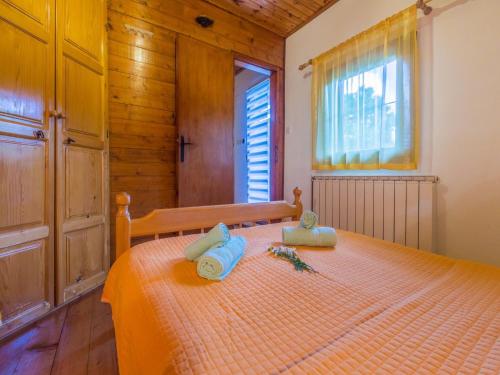 Ένα ή περισσότερα κρεβάτια σε δωμάτιο στο House Adrijana