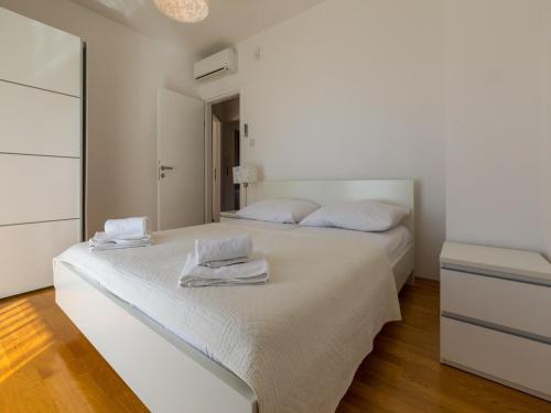 Postel nebo postele na pokoji v ubytování Villa CARPE DIEM