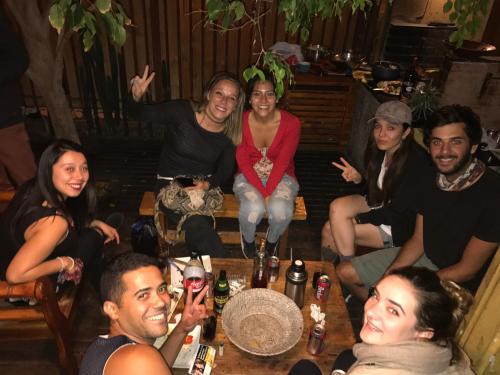a group of people posing for a picture at a party at Backpacker's Hostel Iquique in Iquique