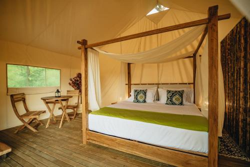 Postel nebo postele na pokoji v ubytování Glamping Entre Rios
