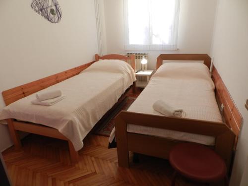Postel nebo postele na pokoji v ubytování Levak Apartments - Apt. 2