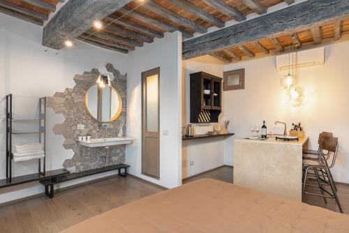 En eller flere senge i et værelse på Milipano Studio Apt