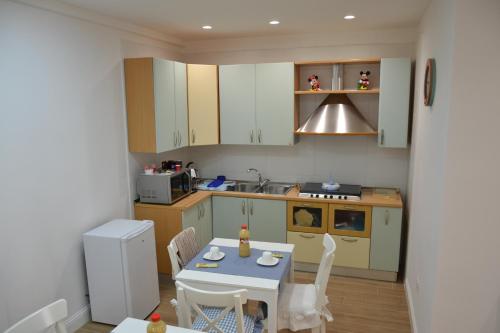 Kuchyň nebo kuchyňský kout v ubytování B&B Coffee and City Pompei