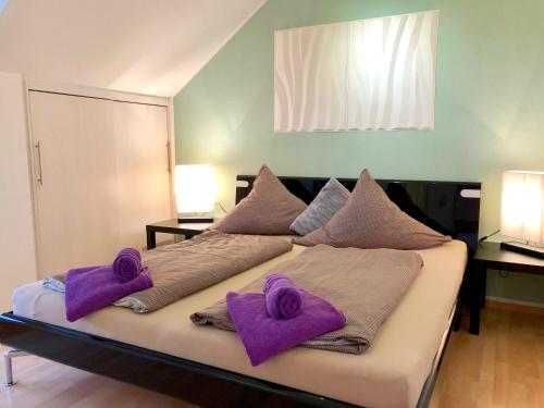 Tempat tidur dalam kamar di FeWo Seeperle mit Seesicht