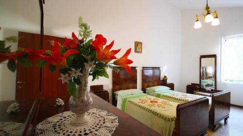 A bed or beds in a room at Country House Daniela