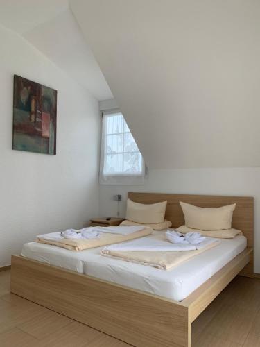 Ένα ή περισσότερα κρεβάτια σε δωμάτιο στο Apartments Marianna
