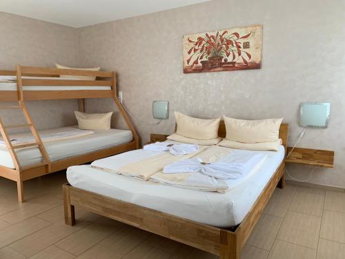 Ένα ή περισσότερα κρεβάτια σε δωμάτιο στο Apartments Marianna