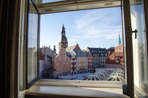 a view of a city from a window at City Inn Riga Apartment, Town Towers with parking in Rīga