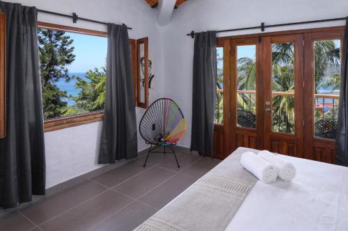 Letto o letti in una camera di DISTRITO 88 - Hotel Boutique Only Adults