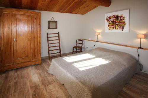 Postel nebo postele na pokoji v ubytování GITE L'ATELIER