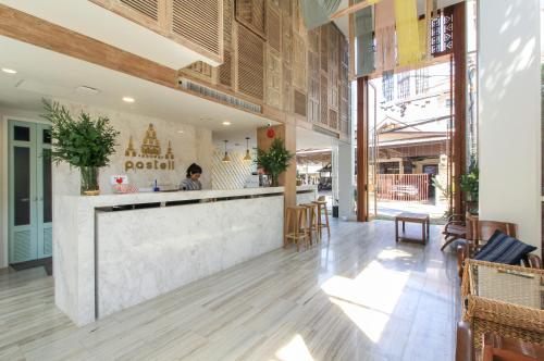 Zona de hol sau recepție la Pastell Oldtown Chiang Mai SHA Extra Plus
