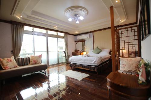 Yilan Pine Villa Homestayにあるベッド