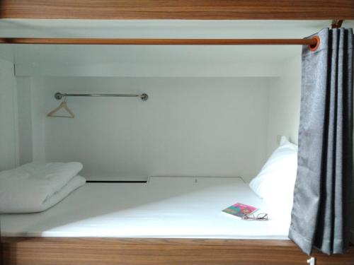 Cama o camas de una habitación en WEE HOSTEL