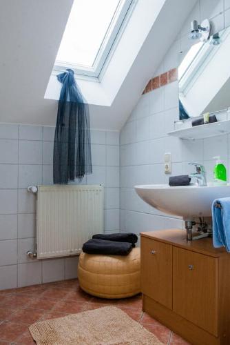 a bathroom with a sink and a mirror at Sixt Martina in Lam