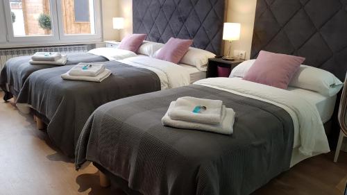 Ένα ή περισσότερα κρεβάτια σε δωμάτιο στο PortoHouse