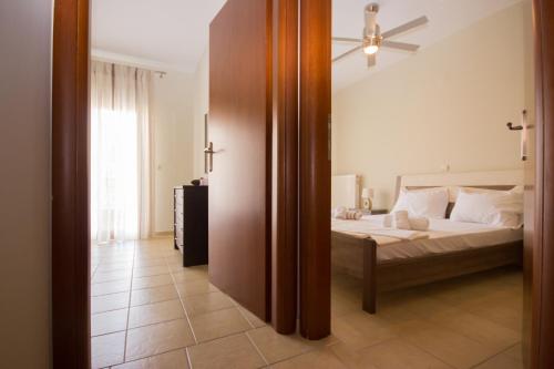 Posteľ alebo postele v izbe v ubytovaní Keramoti Luxury Apartments