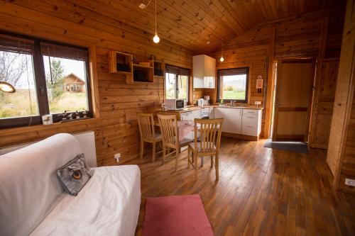 Posezení v ubytování Hestasport Cottages