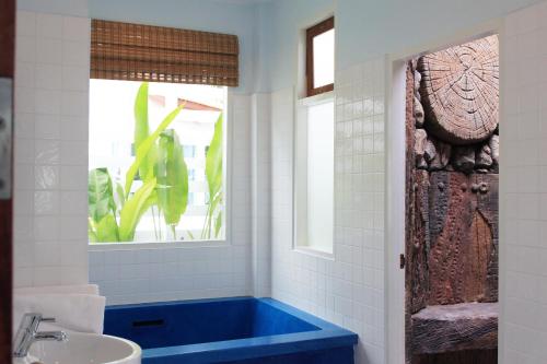 Koupelna v ubytování Baanmontra Beach Resort - Bankrut