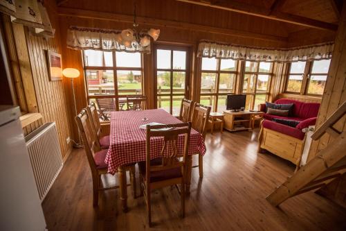Posezení v ubytování Hestasport Cottages