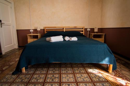 Ένα ή περισσότερα κρεβάτια σε δωμάτιο στο B&B Le finestre sul mare