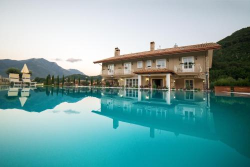 a house sitting on top of a large body of water at Maralè in Serino