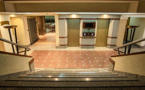 a view of a stairway in a building at Hotel Libertador in Santiago