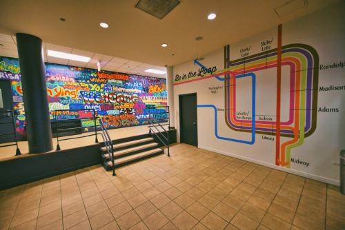 a gym with a large mural on the wall at HI Chicago Hostel in Chicago
