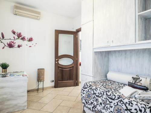 En eller flere senge i et værelse på La Strada al mare