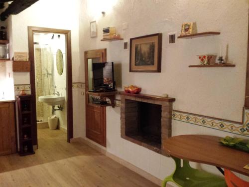 Kuchyň nebo kuchyňský kout v ubytování Casa Conti di Sotto