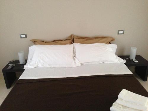 Posteľ alebo postele v izbe v ubytovaní B&B In Salento