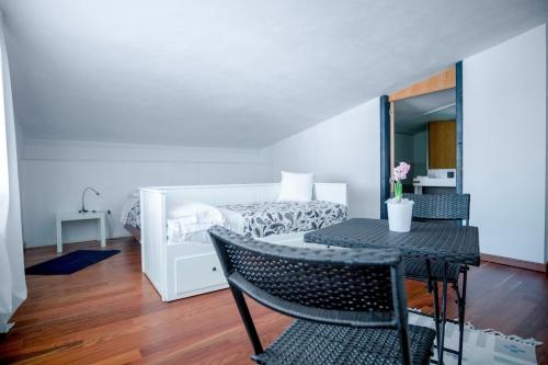 Katil atau katil-katil dalam bilik di Villa Wanda - Residenza di charme