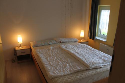 Tempat tidur dalam kamar di Friesenstube