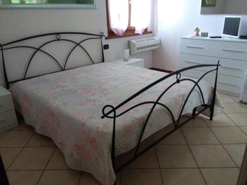 Postel nebo postele na pokoji v ubytování appartamento Margherita