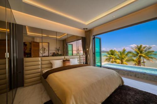 Postel nebo postele na pokoji v ubytování Saengsuree Villas Koh Yao Yai
