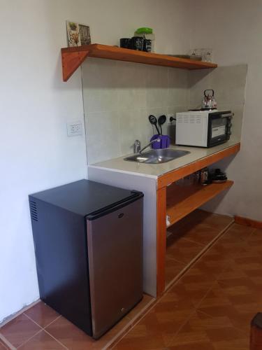 Η κουζίνα ή μικρή κουζίνα στο Casas de Raco